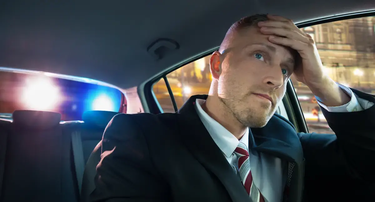 Businessman Being Pulled Over by Police for DUI in Arizona