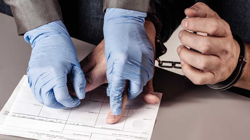 DUI Suspect Being Fingerprinted